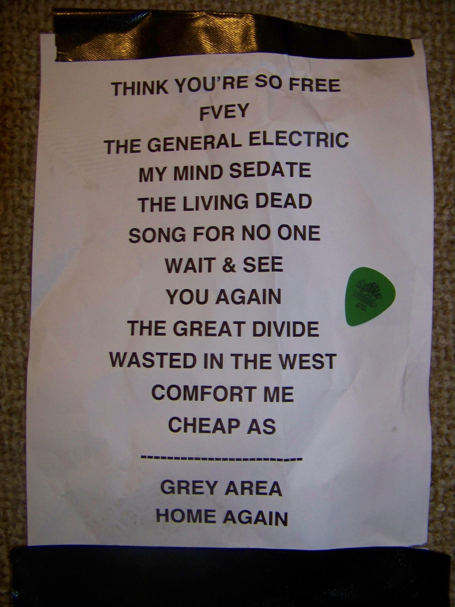 Shihad's set list.  Eight of the songs are from the new album, FVEY. The pick belonged to bass player Karl Kippenberger