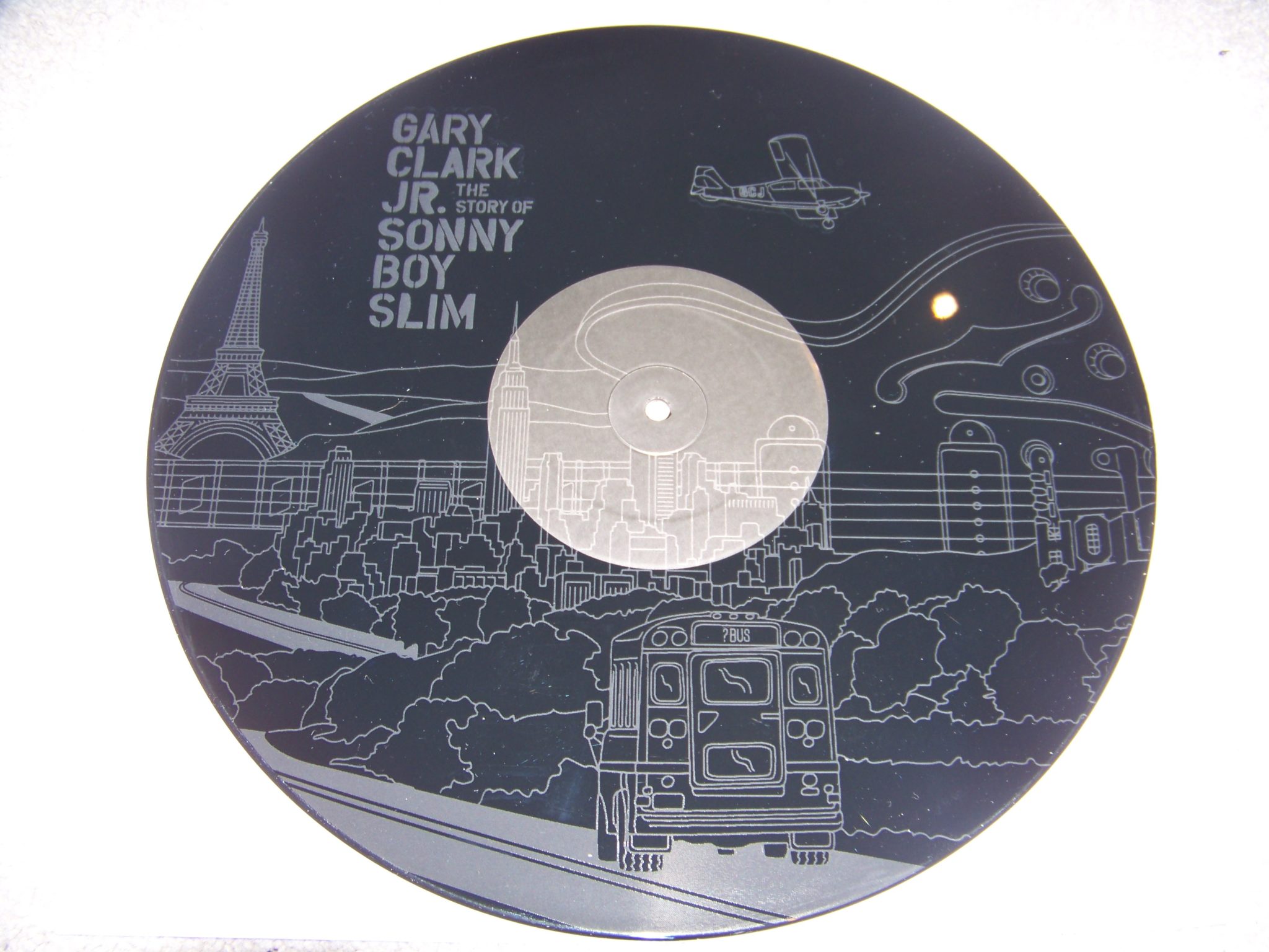 Side D, with laser etchings of the picture from inside the gatefold