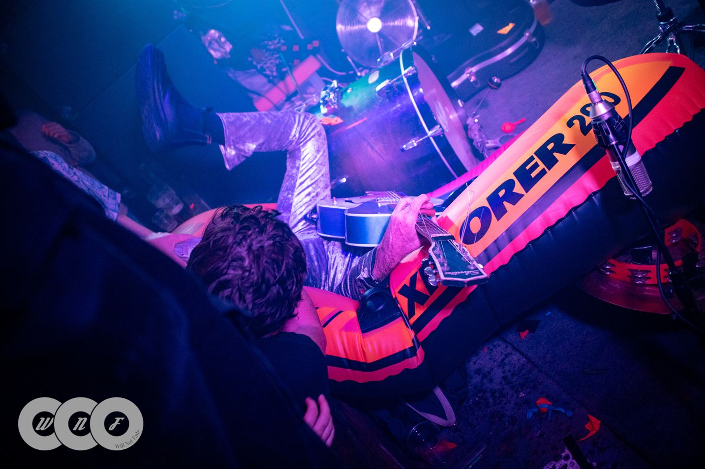 Bob Log III crowd surfing in an inflatable Valhalla